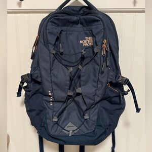 The North Face Borealis Navy Blue and Rose Gold Backpack